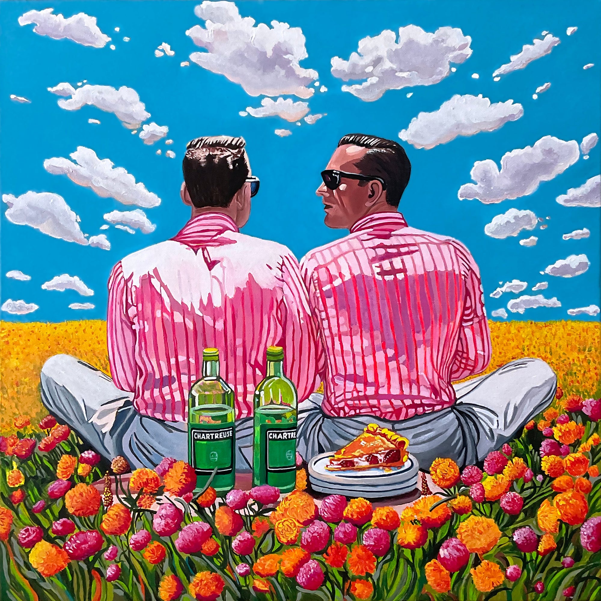 Two men in pink shirts sitting in a field with flowers, bottles, and food, under a blue sky with clouds.
